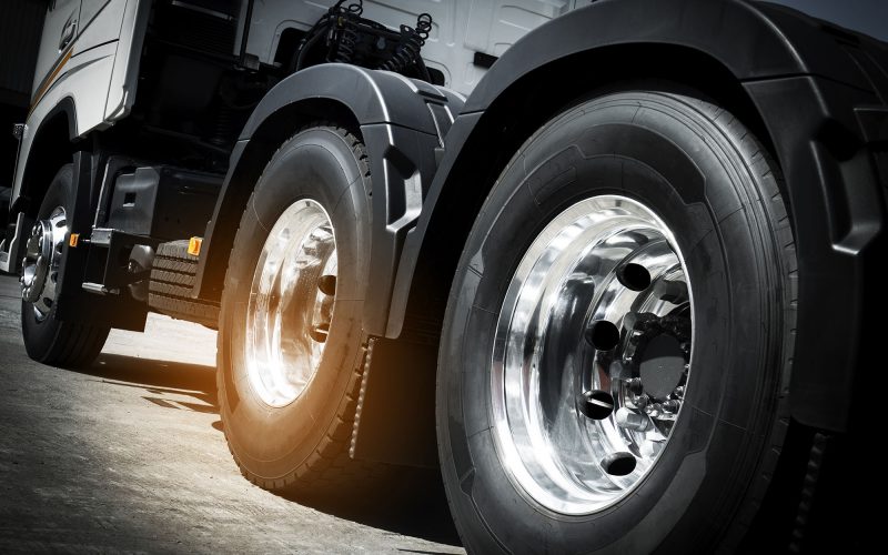 semi truck, closeup truck wheels with new truck tires
